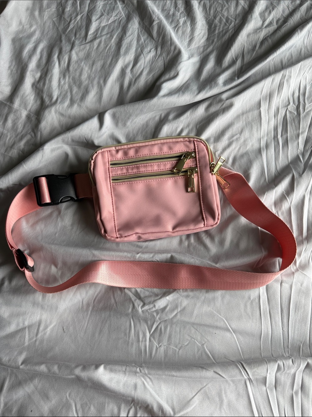 Compact Pink Crossbody Belt Bag with Gold Hardware